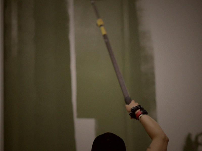 Skilled artisan applying Venetian plaster faux finish — Foti Inc. specialty work